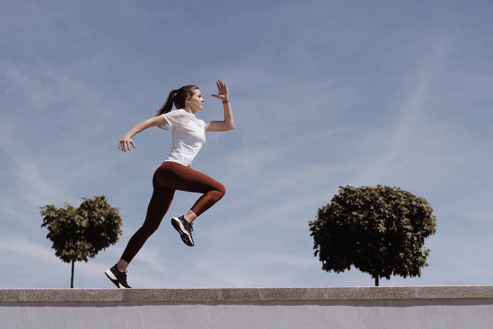 A woman running on an open road